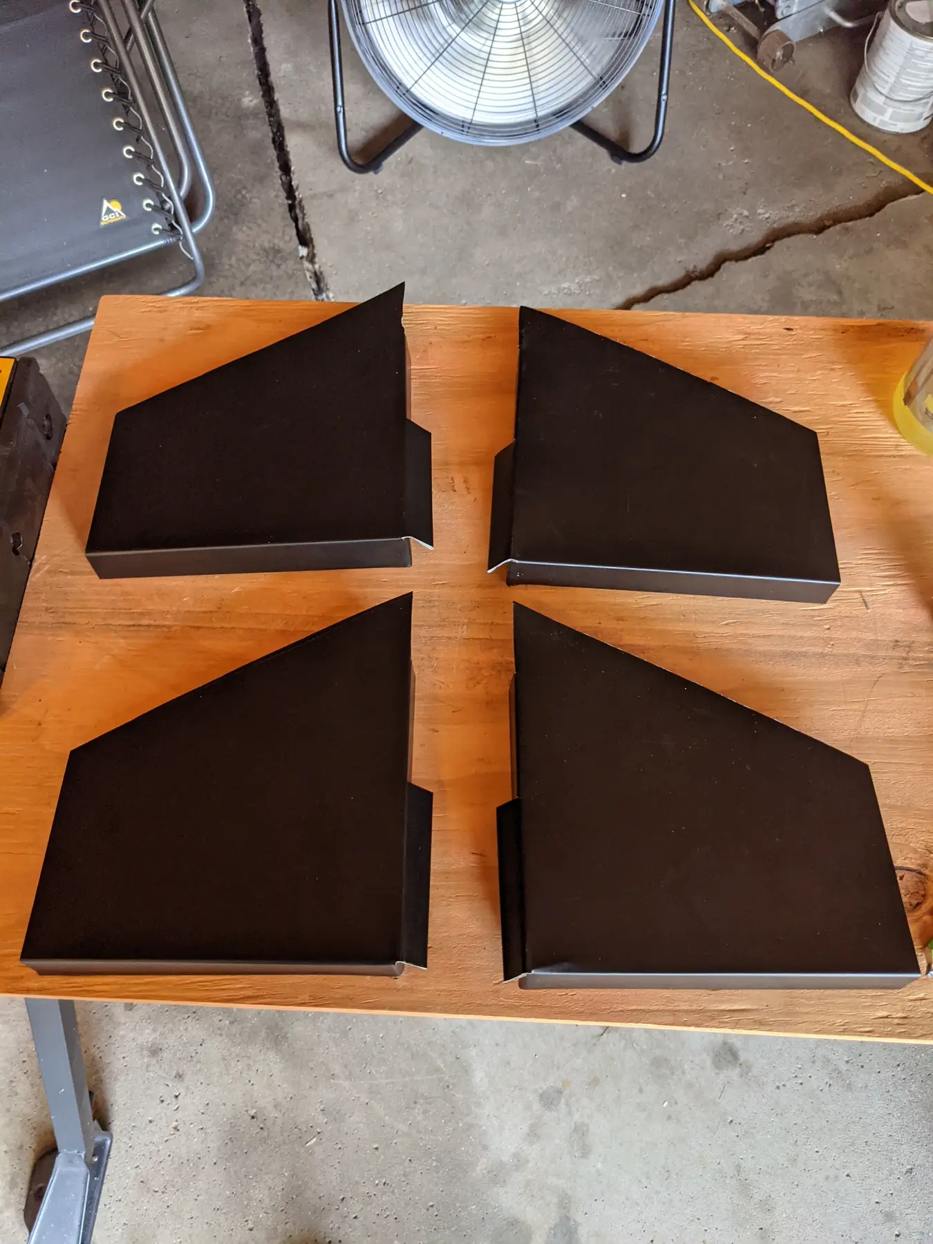 Four matching dark flashing samples after folding.