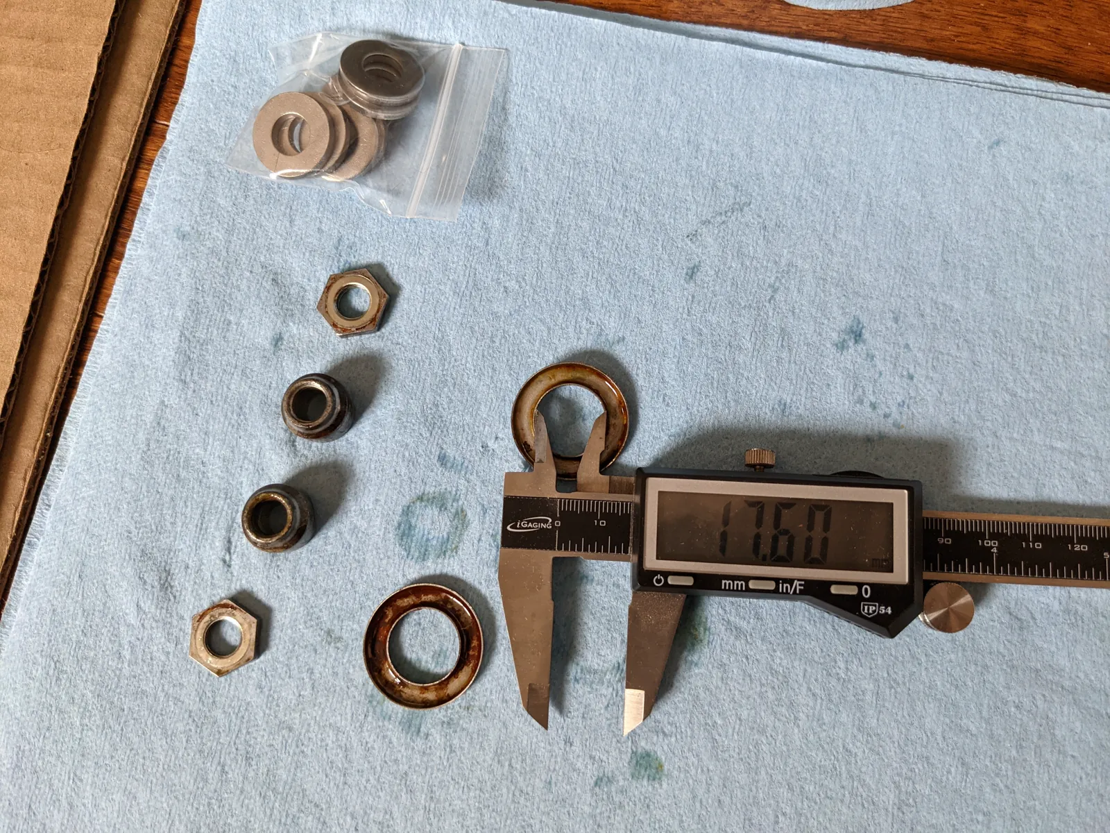 Small hub and axle hardware organized for inspection.