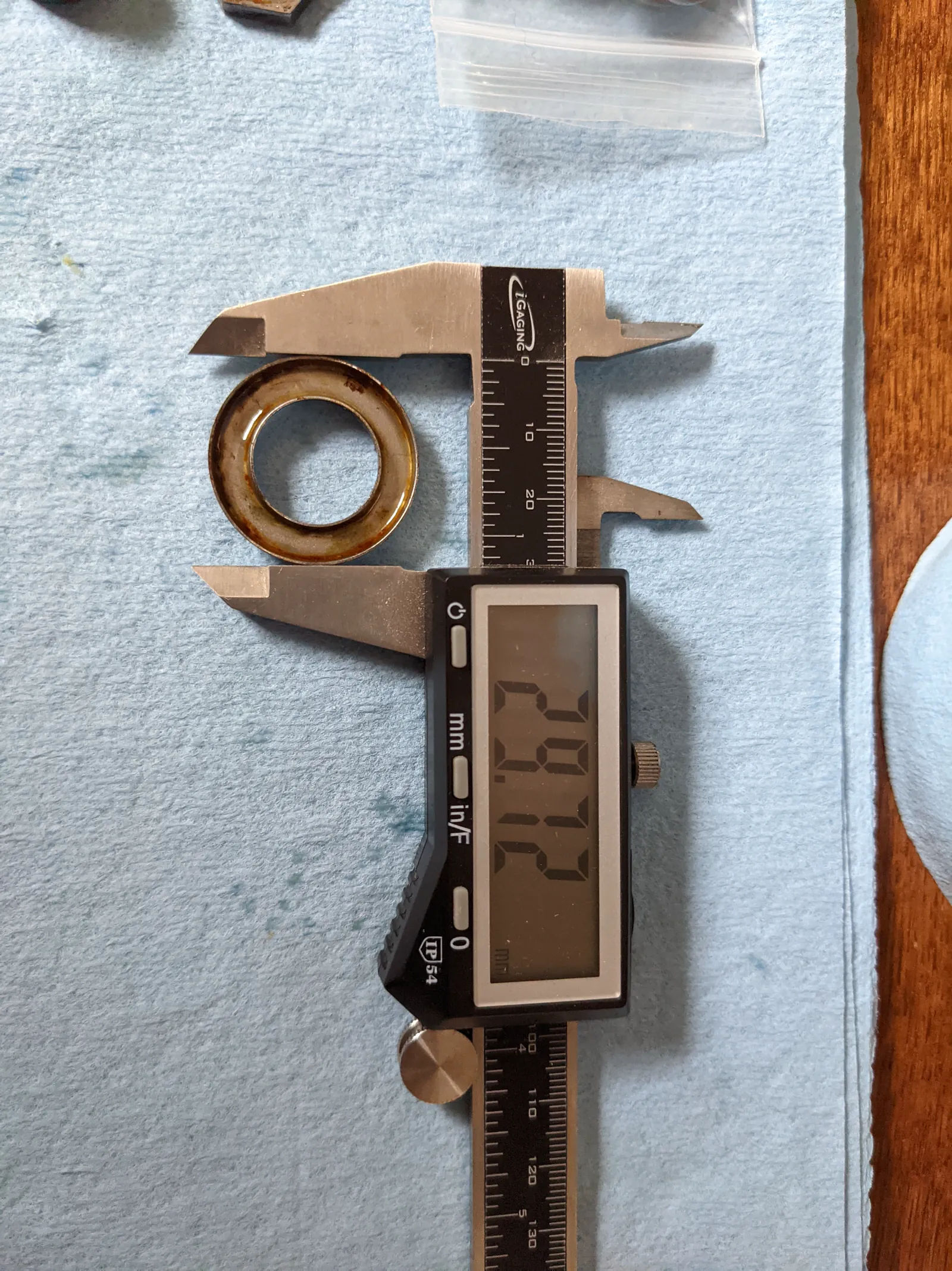 Restoration hardware being measured.