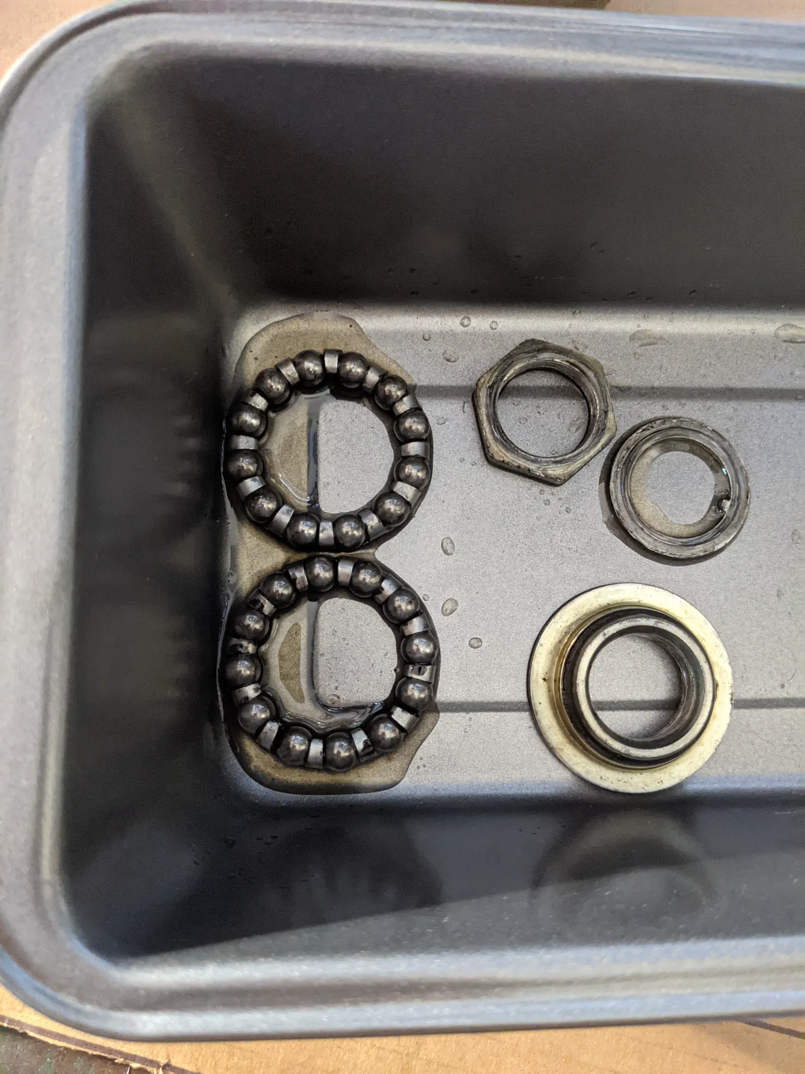Cleaned bearings and races ready for reassembly.