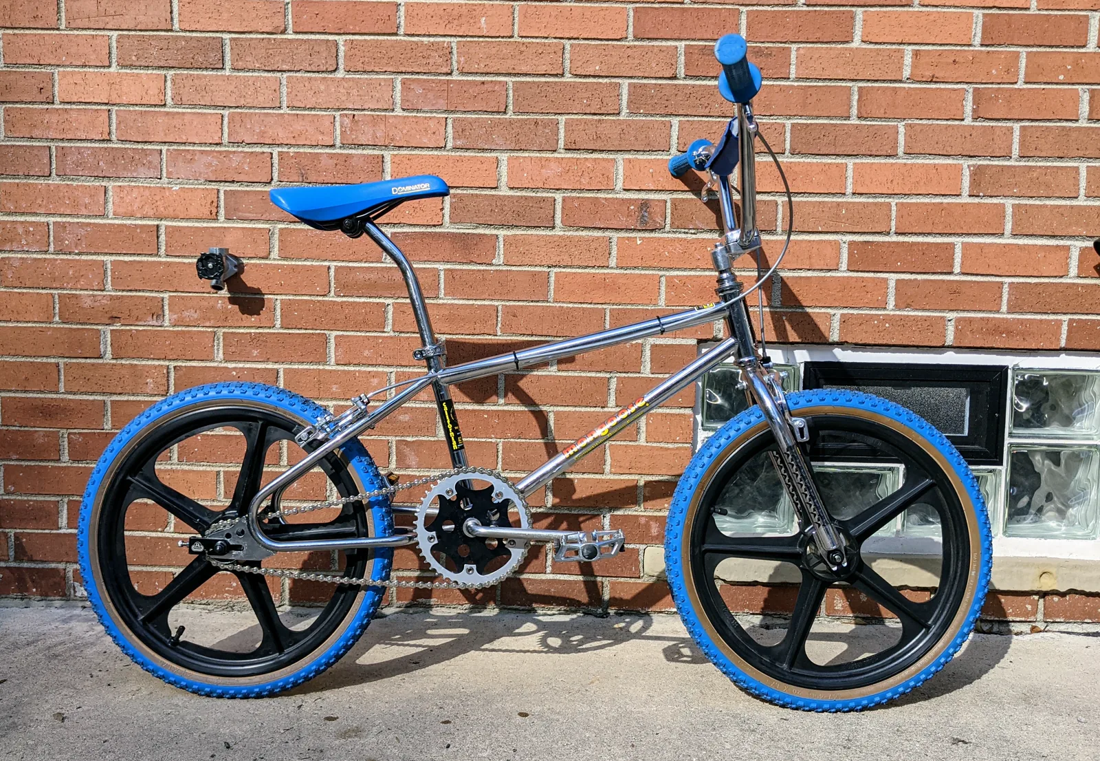 Finished blue 1985 Mongoose Californian with the original black Power Plate installed.