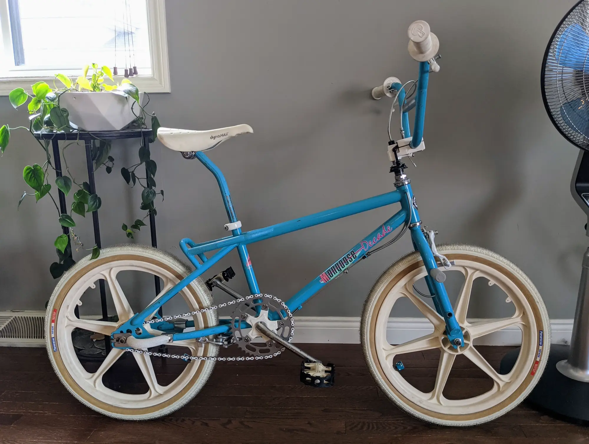 Indoor full side profile of the light-blue and white 1987 Mongoose Decade.
