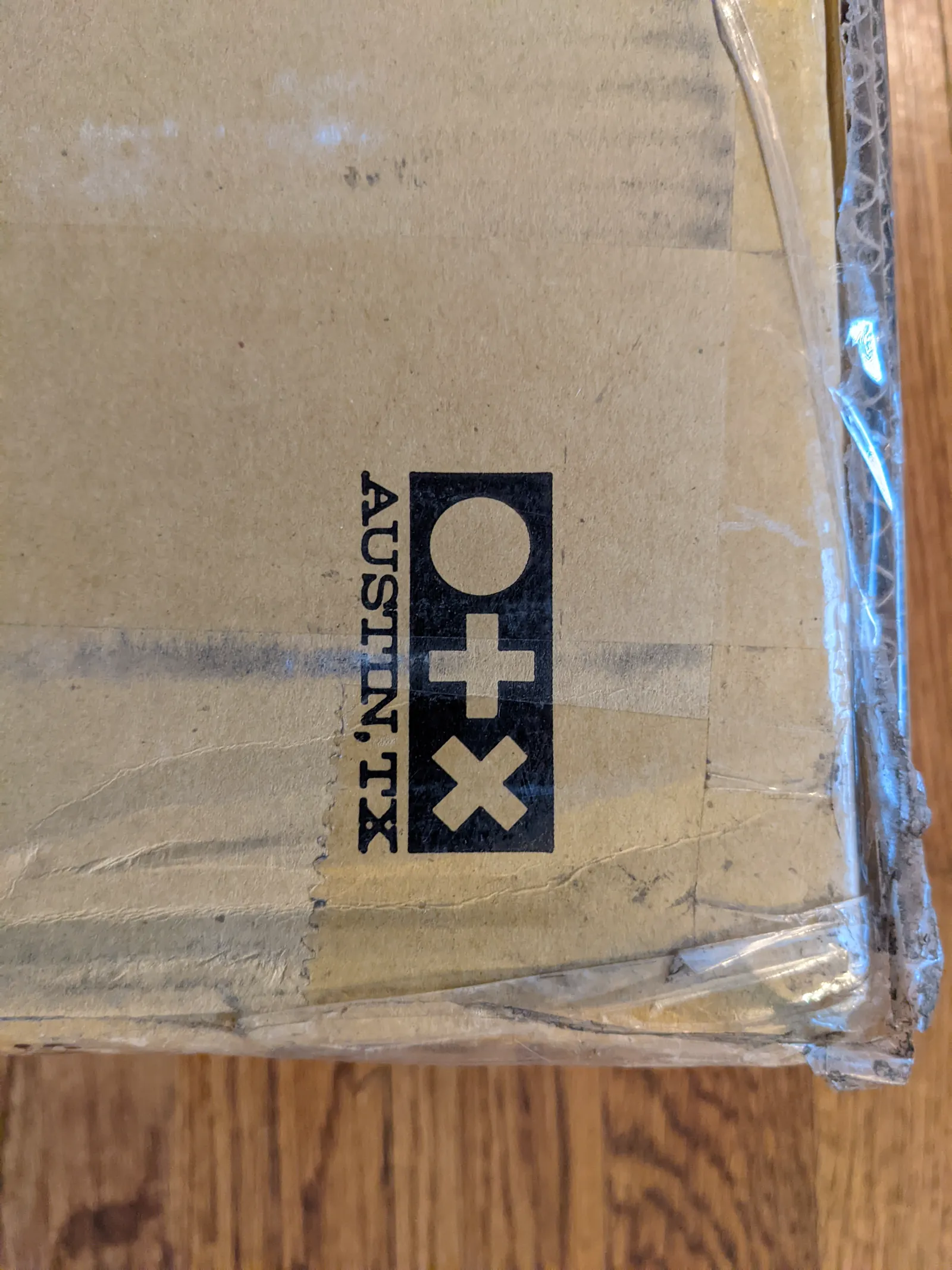 Close view of the Sunday Austin, Texas mark printed on the frame carton.