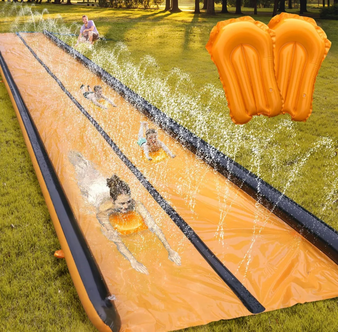 Product image of an orange dual-lane 32-foot slip-and-slide with inflatable side bumpers.