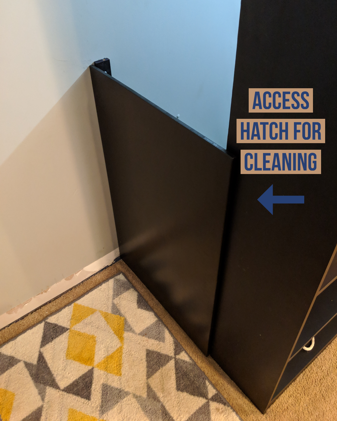 The outside of the tall access hatch used to clean the cat bathroom.